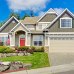 Image shows a typical northwest home with a nice curb appeal one of the top tips on our list.