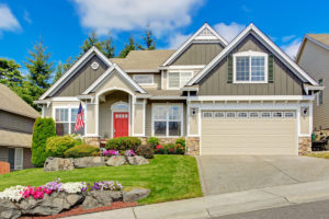 Image shows a typical northwest home with a nice curb appeal one of the top tips on our list.